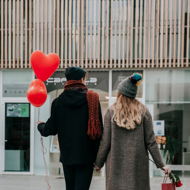 Anonymous couple walking together