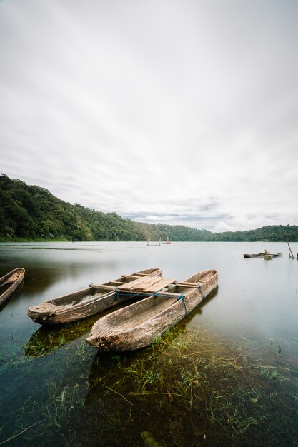 antique boat in lake