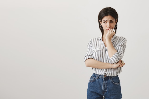 Anxious troubled woman looking away distressed, having problem