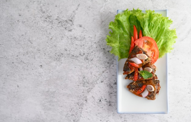 Appetizers with spicy sardine mixed with herbs