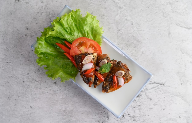 Appetizers with spicy sardine mixed with herbs