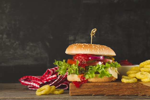Appetizing burger with tomato sauce