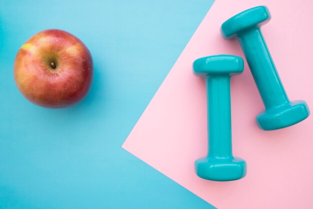 Apple and dumbbells