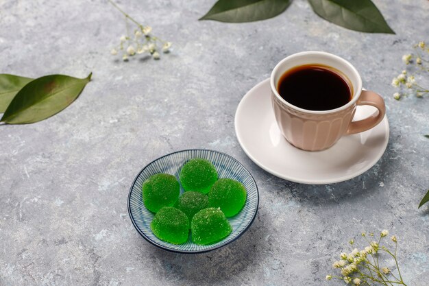 Apple green marmalade candy in sugar. Healthy dessert for gourmets.