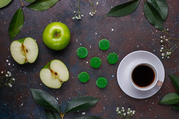 Apple green marmalade candy in sugar. Healthy dessert for gourmets.