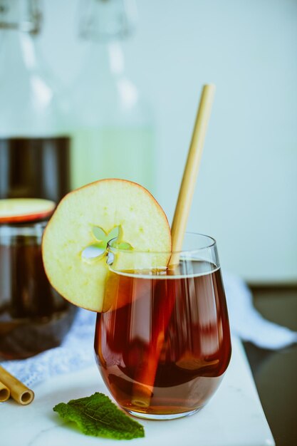 Apple homemade Kombucha in glass beakers