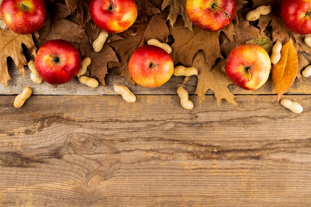 Free photo apple and leaves autumn composition copy space