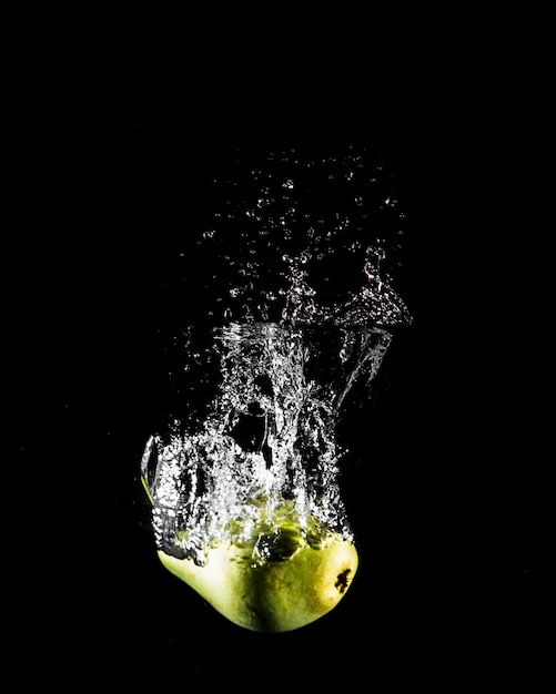 Apple plunging into the water