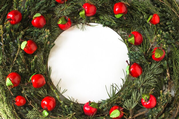 Apples on conifer wreath