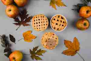 Free photo apples and leaves around pies
