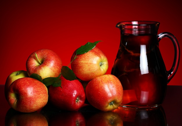 Apples and pitcher with juice