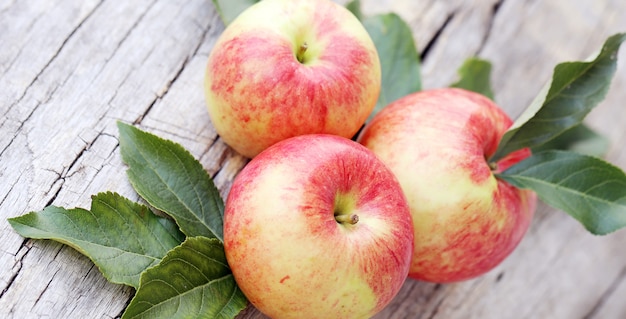 Apples on a wooden surface