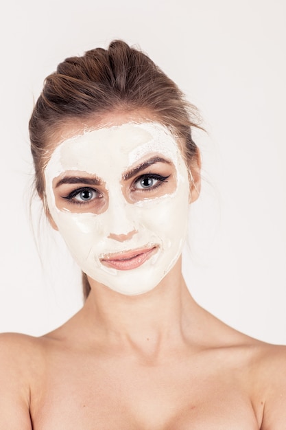 applying beauty facial mask skin