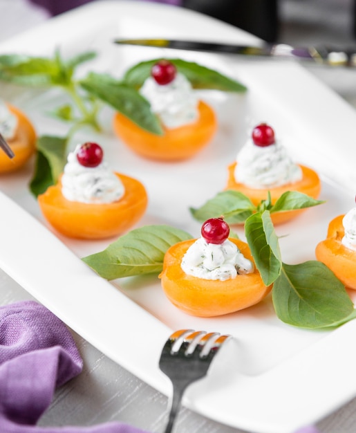 Apricot with cream and cranberry