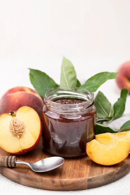 Apricots jam on wooden board