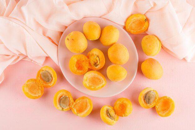 Apricots in a plate. flat lay.