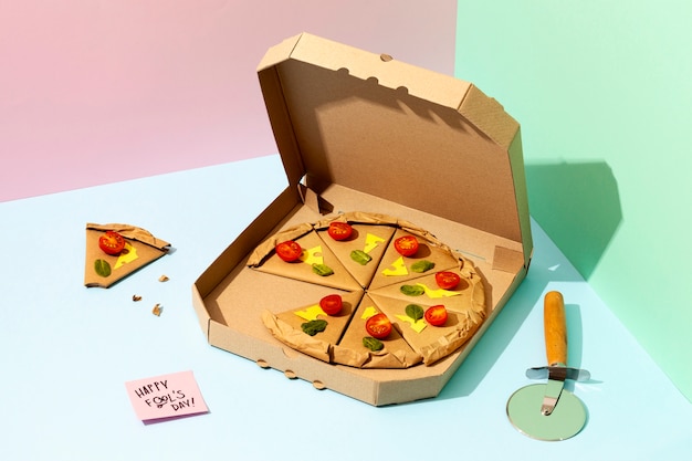 April fools day still life with paper pizza