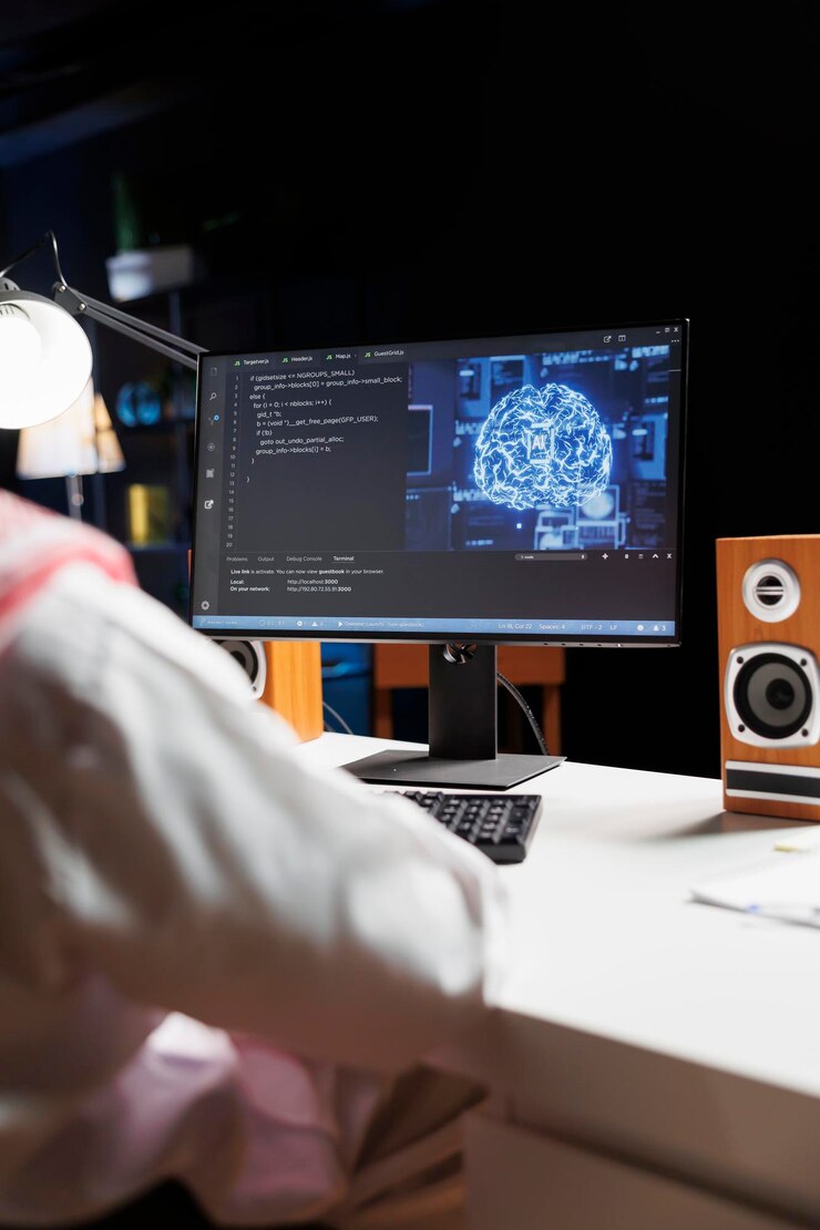 Free Photo arab guy utilizes ai on desktop computer