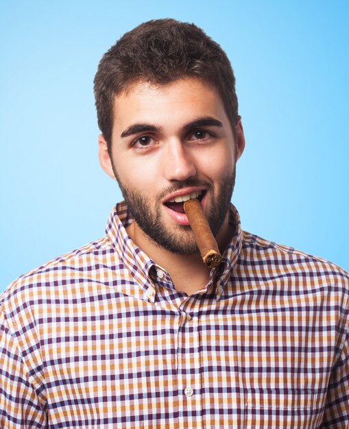 Arab man standing on blue background. 