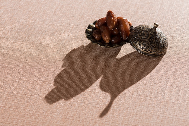 Free photo arabic food composition with shadow for ramadan