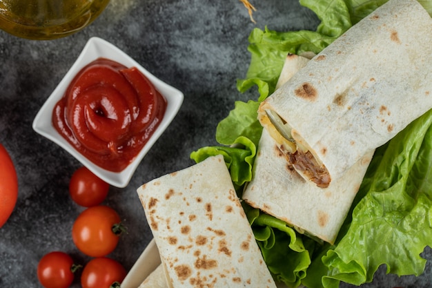 Arabic street food shaurma in lavash with ketchup