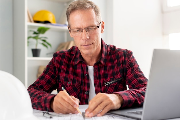 Architect doing a project at his desk