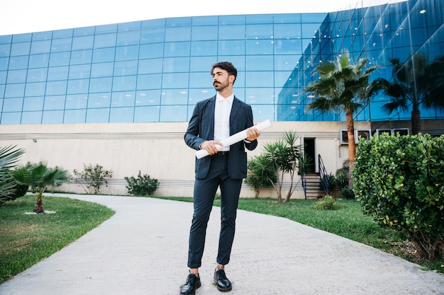 Free photo architect in front of building