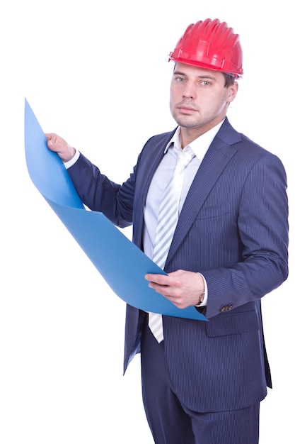 Architect in red hardhat holding blueprint