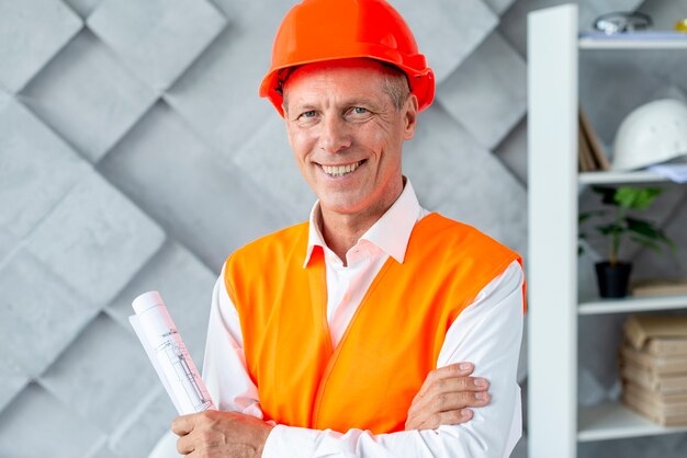 Architect smiling in safety equipment