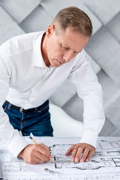 Architect working on complex plan