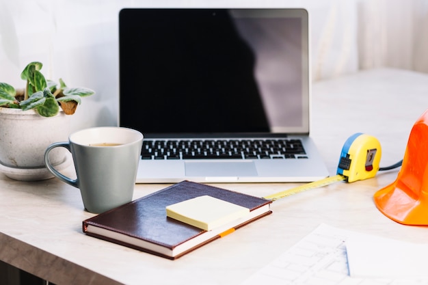 Architecture concept with laptop on workspace