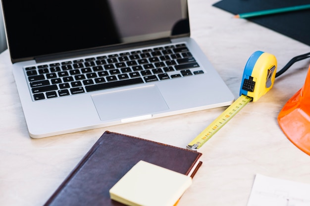 Architecture concept with laptop on workspace