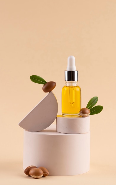 Argan oil in dropper bottle arrangement