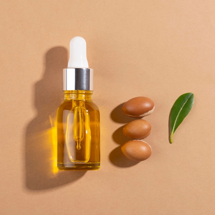 Free Photo argan oil in dropper bottle assortment