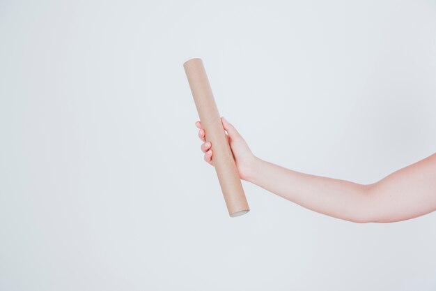 Arm and cardboard tube