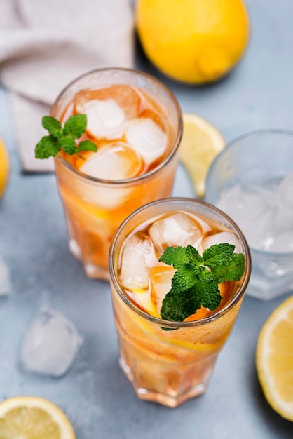 Free photo aromatic lemon ice tea glasses