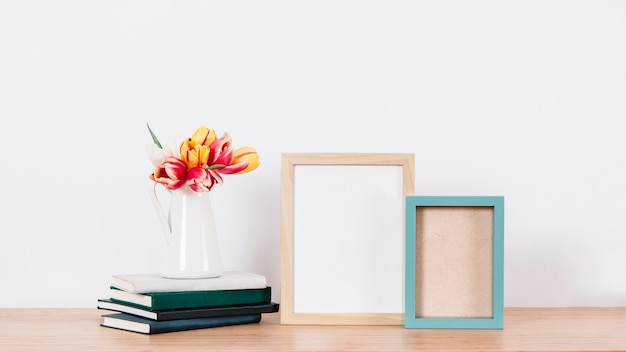 Arranged books and picture frame