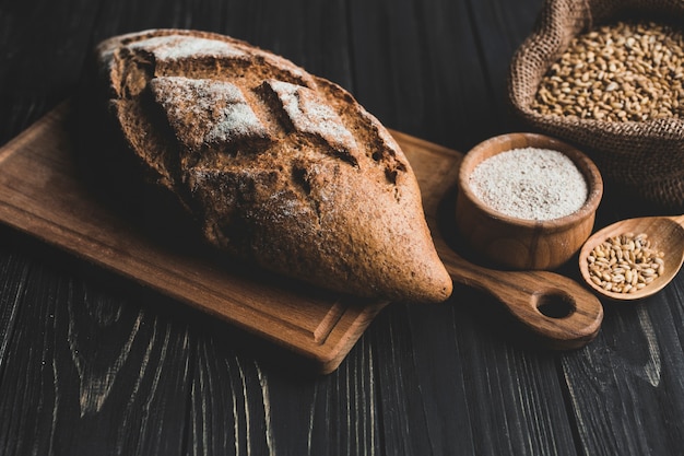 Arranged loaf of bread and grains