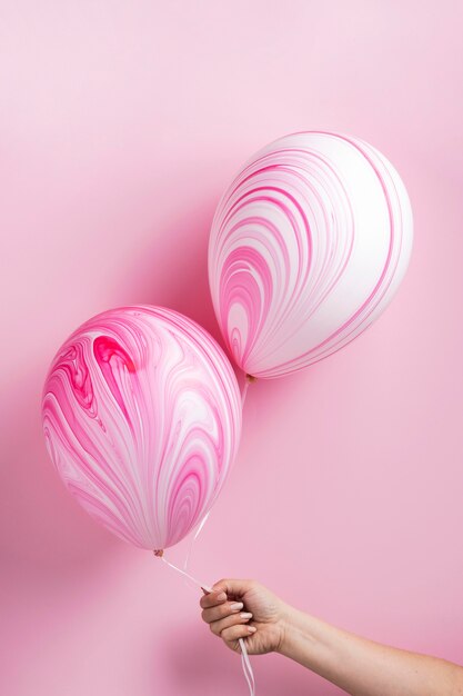 Arrangement of abstract pink balloons