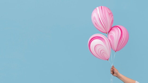 Arrangement of abstract pink balloons