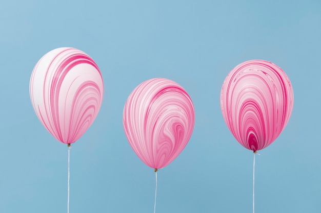 Foto gratuita disposizione di palloncini rosa astratti