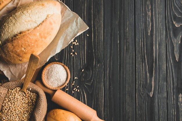 Arrangement of baked bread and flour