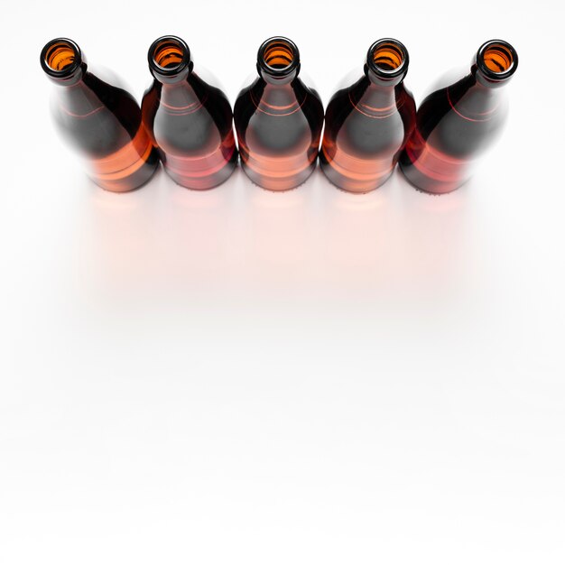 Arrangement of beer bottles with copy space