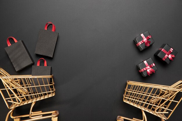 Arrangement of black friday shopping carts with copy space