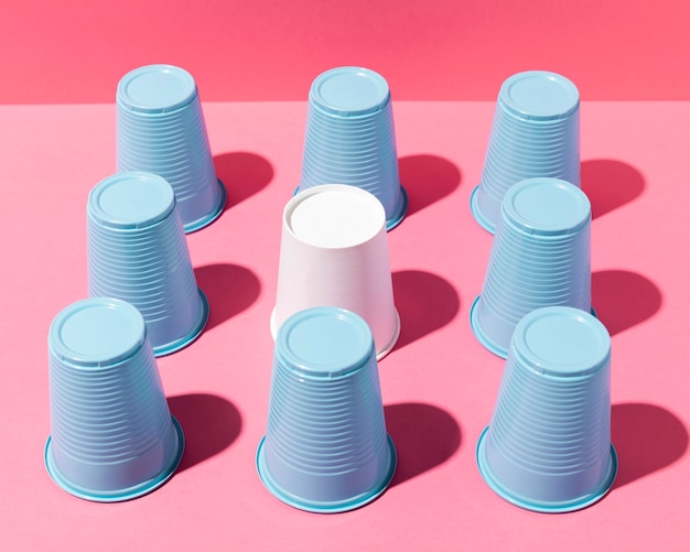 Free photo arrangement of blue plastic cups