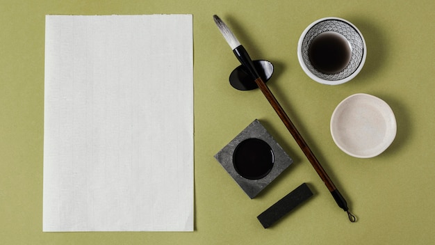 Free photo arrangement of chinese ink with empty paper