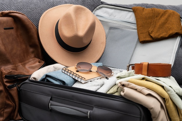 Arrangement of clothes and accessories in a suitcase