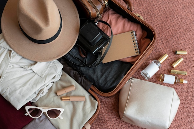 Arrangement of clothes and accessories in a suitcase