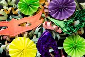 Free photo arrangement of colorful paper ribbons and masks
