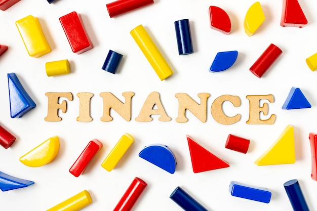 Arrangement of colourful geometrical shapes and finance text